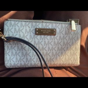 Michael Kohr’s wallet/wristlet. Gently used